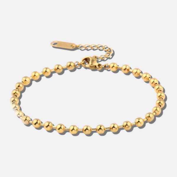 Armbånd med sølvfarvet anker i rosa og blå fra OPUA